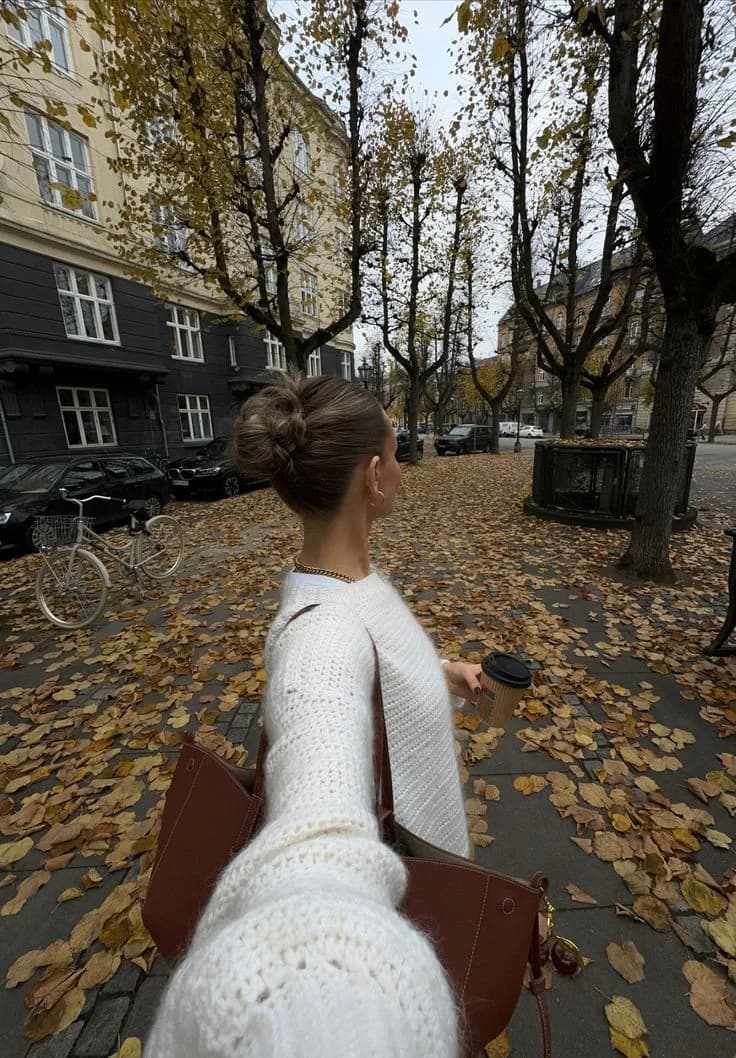 A walk along a tree-lined city street in autumn