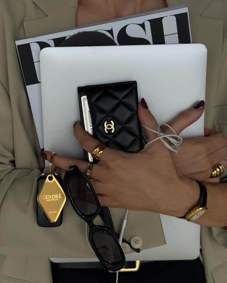 A laptop, magazine and personal essentials carried together